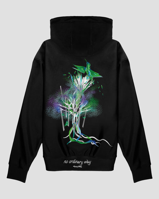 GoofyPRO Cayton XTR Hoodie in black. A graphic of a colourful bird flying out of a colourful tree with ribbons in Green seasonal colours. White embroidered 'no ordinary way' on waistband.