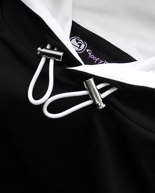 GoofyPRO Cayton Core black Hoodie toggle close up. Silver toggles with white cord.