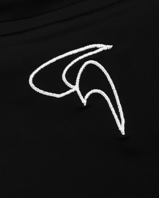 GoofyPRO Cayton Core Performance Tshirt in black, close up of white embroidered logo at top of rear neck.