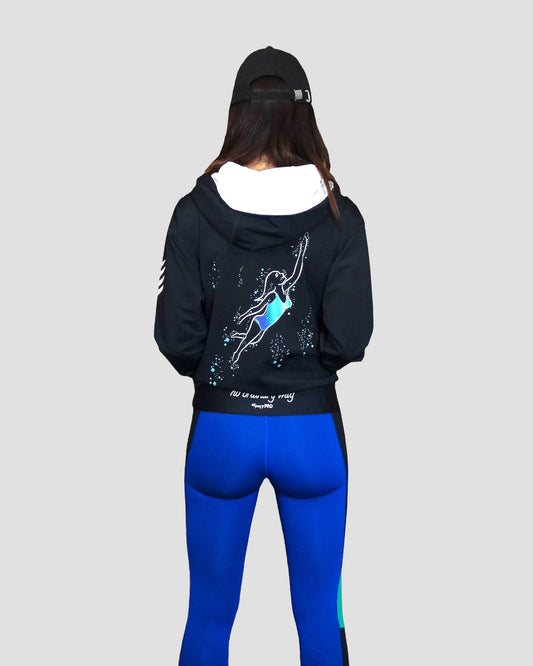 GoofyPRO Cayton Core Hoodie in black. With water based graphic design of woman swimming underwater with bubbles. Embroidered - no ordinary way.