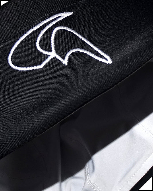GoofyPRO Cayton Beanie in black, close up of Embroidered white logo. White inner lining.