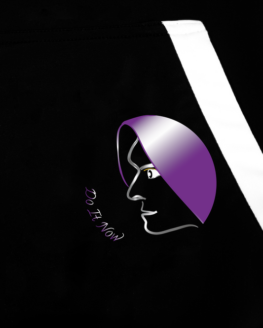 GoofyPRO Cayton XTR Hoodie in black. A close up of graphic on front pocket of a face in purple, silver and white with Do It NOW writing. White pocket trim.