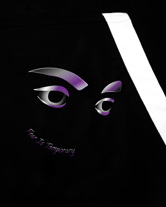 GoofyPRO XTR Hoodie in black close up of pocket graphic of two eyes in silver and purple with words 'Fear Is Temporary' White pocket trim.