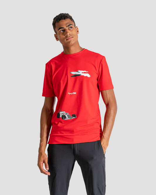 GoofyPRO Cayton Core Performance Tshirt in red with male model. Graphic on front of a racing car and motor boat in silver and white.