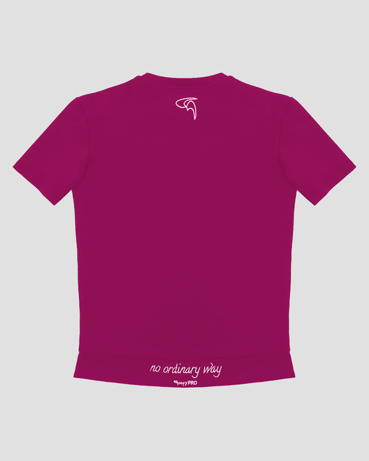 GoofyPRO Cayton Core Performance Tshirt in dahlia pink with short sleeves, rear. White embroidered 'no ordinary way' in white on waistband. White embroidered logo at top of neck.