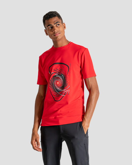 GoofyPRO Cayton Core Performance Tshirt in red with short sleeves. A graphic of black head outline under a swirling red and silver track. Worn by male model.