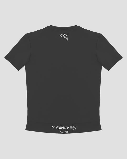 GoofyPRO Cayton Core Performance Tshirt in titanium with short sleeves, rear. White embroidered 'no ordinary way' in white on waistband. White embroidered logo at top of neck.