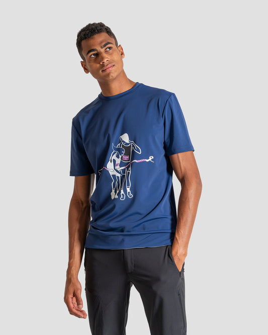 GoofyPRO Cayton Core Performance Tshirt in blueberry with short sleeves. A graphic of two runners crossing the finishing line together. worn by male model