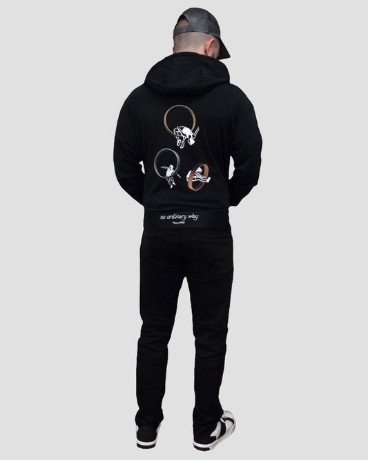 GoofyPRO Cayton Core Hoodie in black. With water based graphic design of GoofyPRO man jumping, running and throwing, through metallic circles. Embroidered - no ordinary way