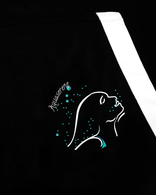 Close up of GoofyPRO Cayton Core Hoodie in black, front pocket. With water based graphic design of woman swimming underwater with bubbles