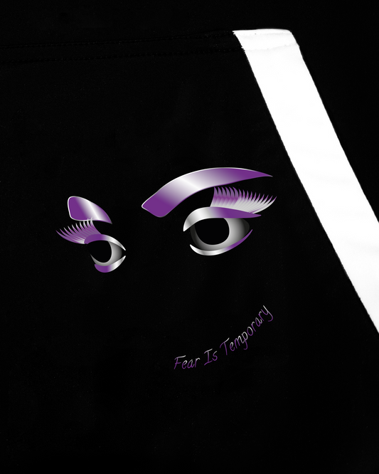 GoofyPRO Cayton XTR Hoodie in black with white trim on kangaroo pocket. A close up of graphic of two eyes in purple and silver with the words' fear is temporary' .