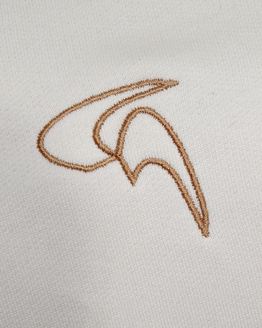 GoofyPRO Daymer Fleece-Hoodie close up of Embroidered Logo in rose gold thread.