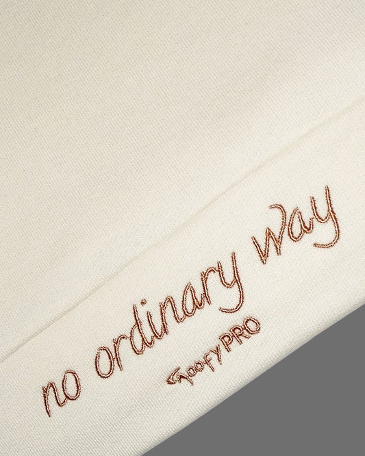 GoofyPRO Daymer Fleece-Hoodie close up of Waistband with rose gold Embroidery 'no ordinary way'.