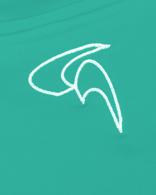 GoofyPRO Cayton Core Performance Tshirt in caraibi green, close up of white embroidered logo at top of rear neck.